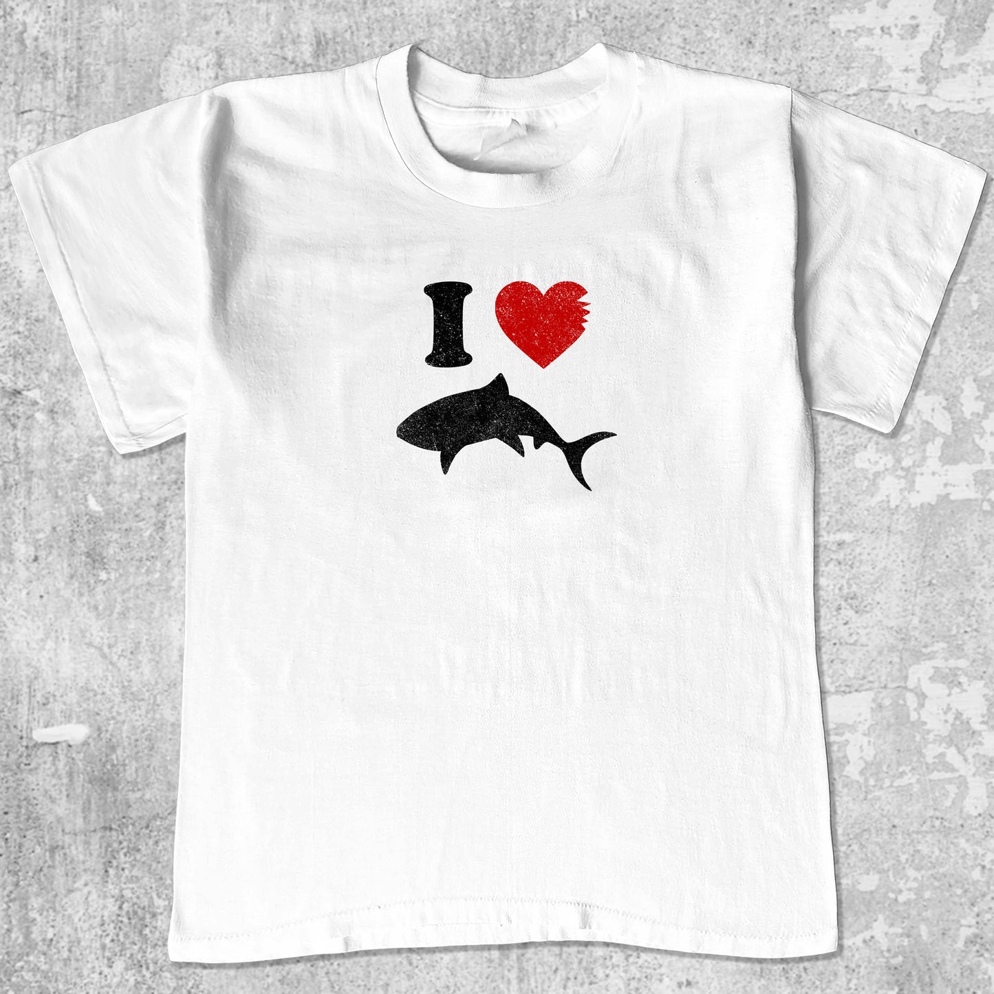 Love Sharks graphic tee with bold and humorous print, funny and trendy graphic. Perfect for adults and gift-giving. White shirt.