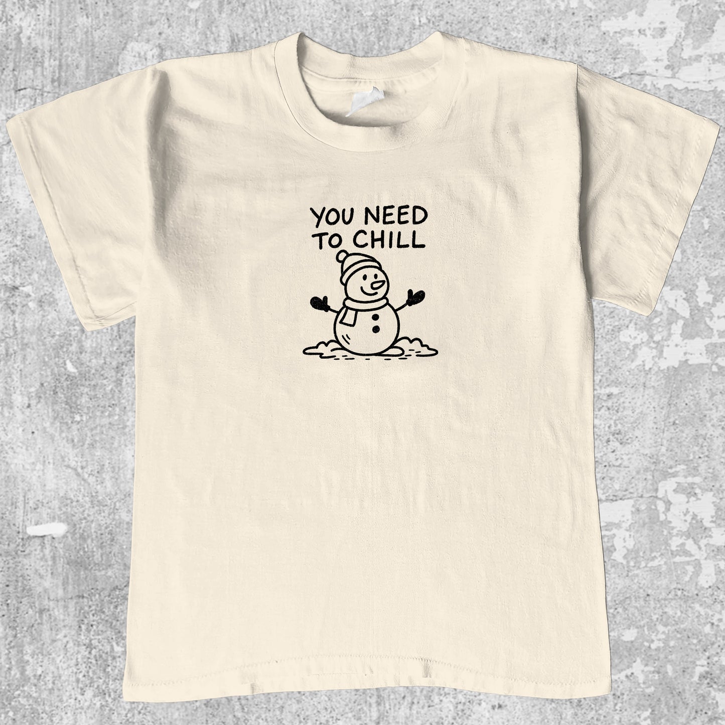 You Need To Chill graphic tee with christmas snowman print, funny and simple graphic. Perfect gifts for Christmas. Cream shirt.