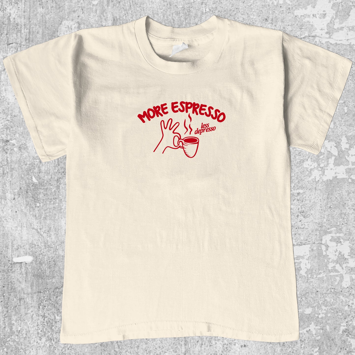 More Espresso Less Depresso graphic tee with retro coffee print, funny and trendy graphic. Perfect for friends. Cream shirt.