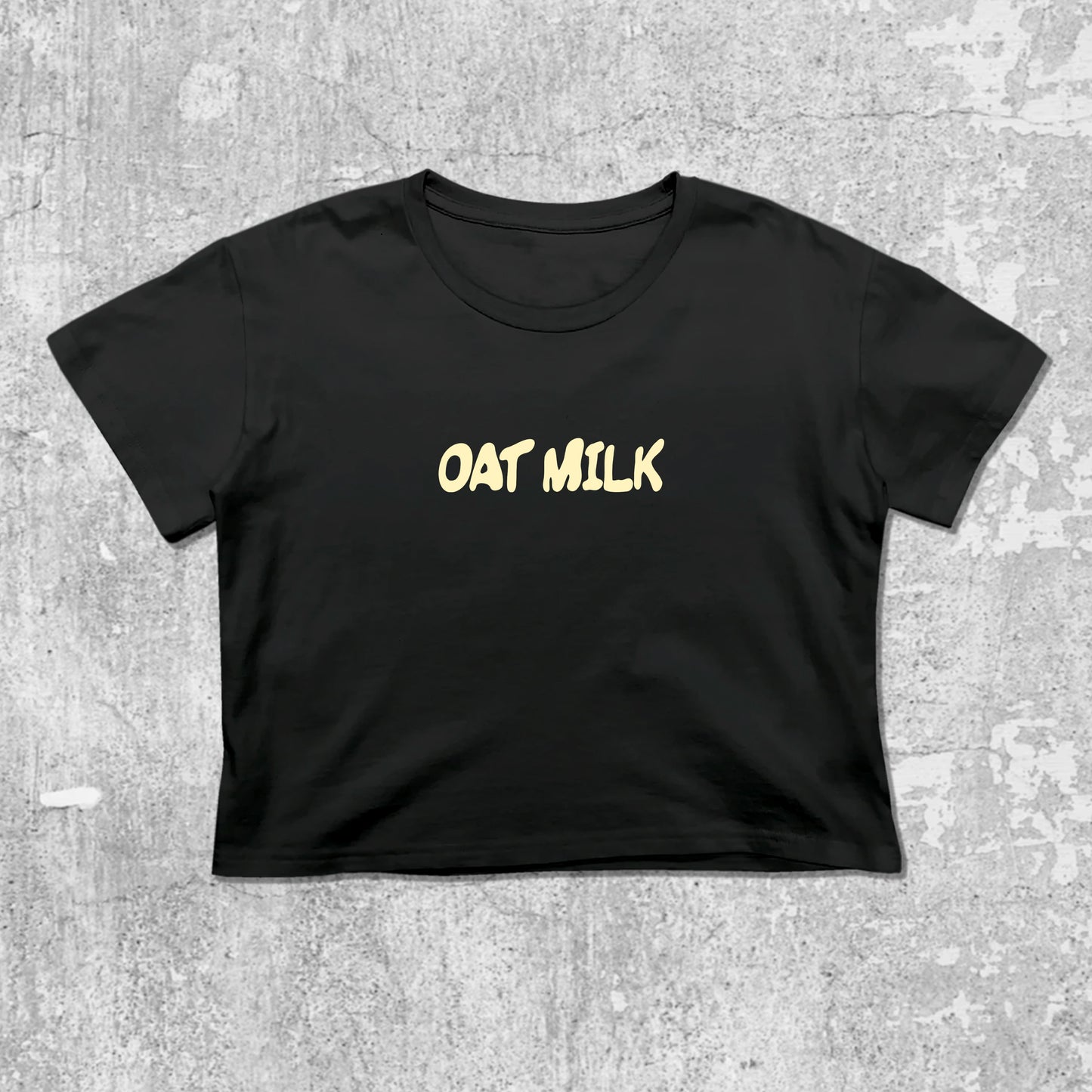 Oat Milk graphic crop tee with cute and trendy fit, featuring playful vintage graphic, stylish cut. Black crop t-shirt