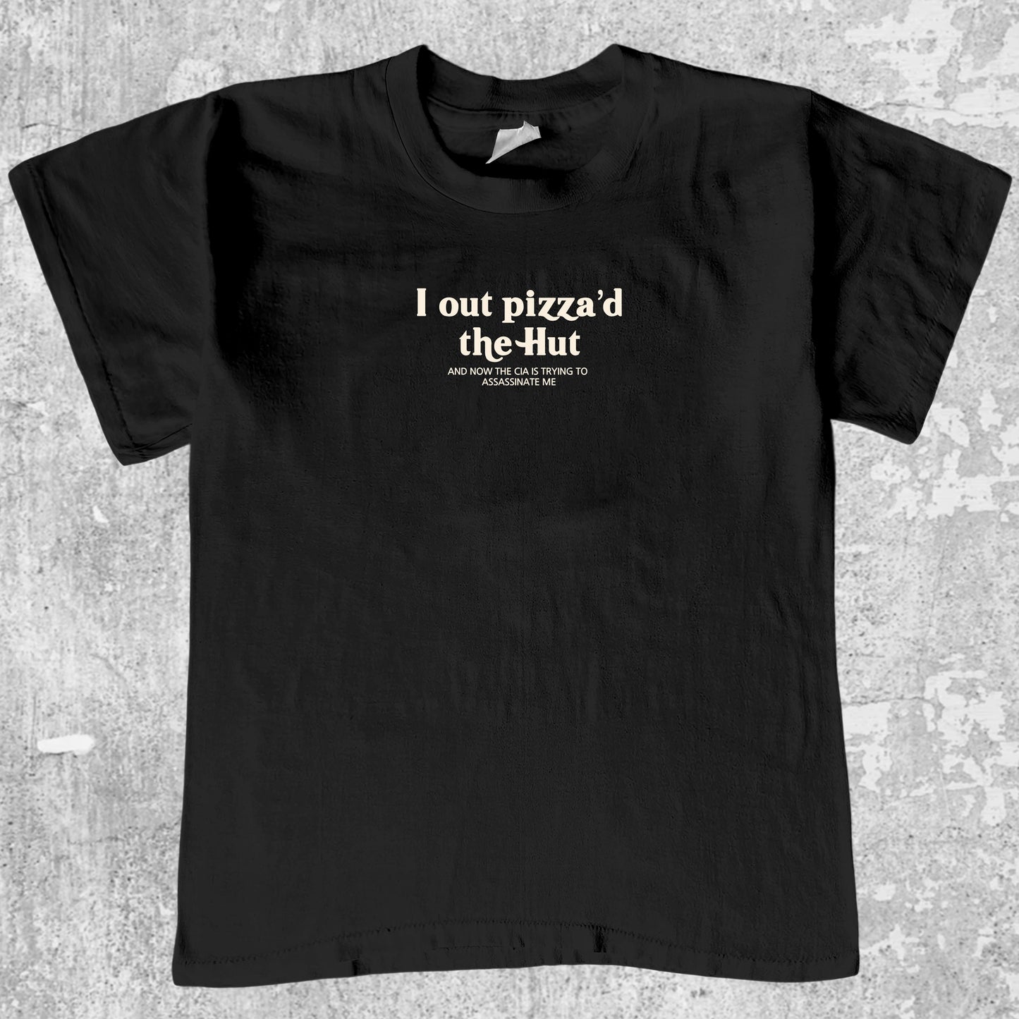 I Out Pizza'd The Hut graphic tee with bold and humorous print, funny and trendy graphic. Perfect for adults and gift-giving. Black shirt.