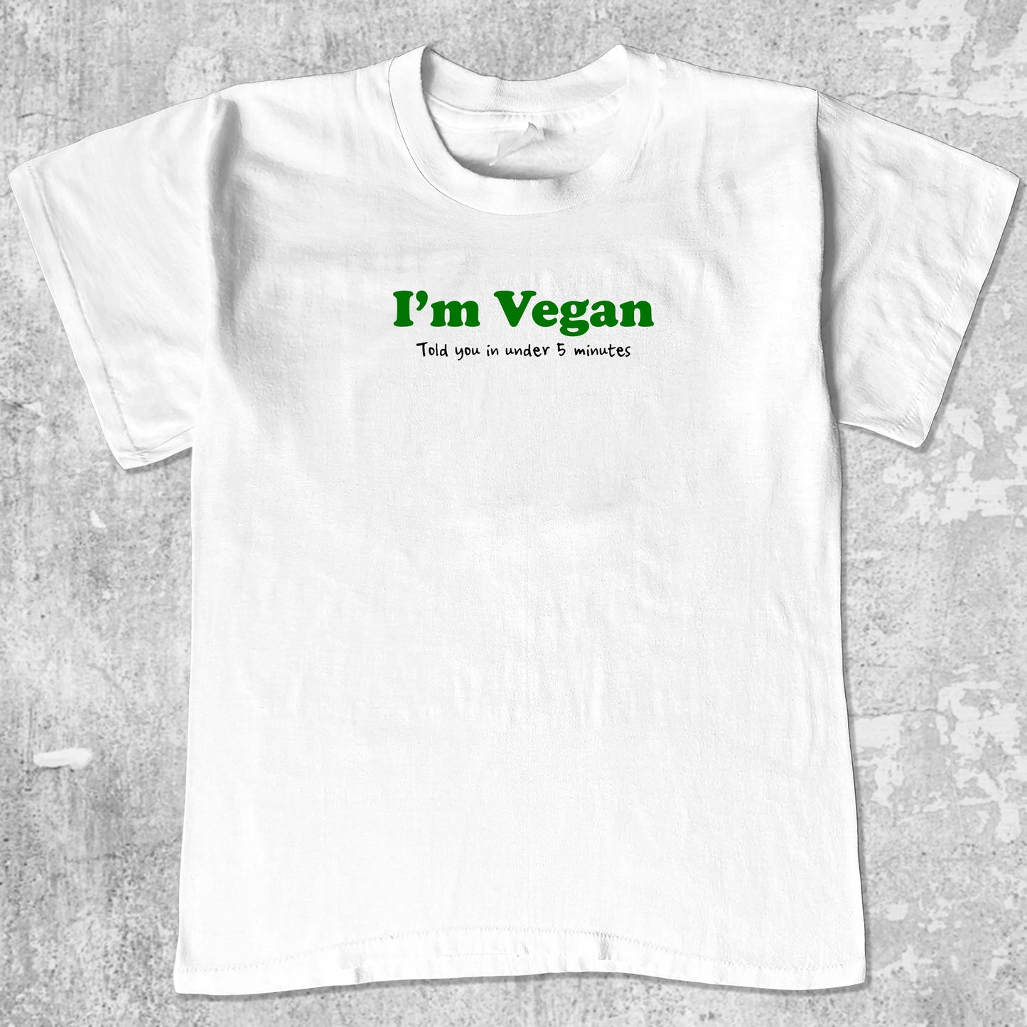 I'm Vegan graphic tee with bold and humorous print, funny and trendy graphic. Perfect for adults and gift-giving. White shirt.