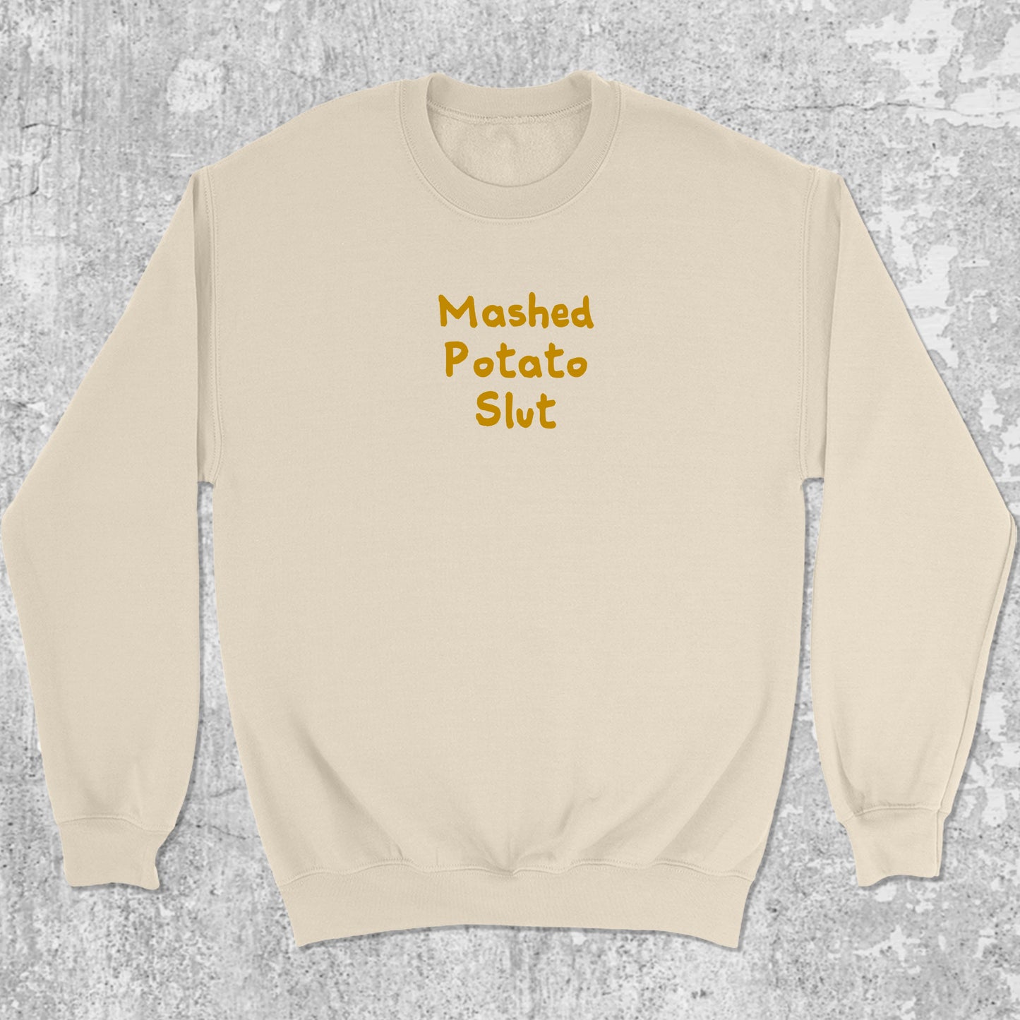 Mashed Potato Slut graphic sweatshirt with bold and humorous print, warm and cozy graphic for everyday wear. Perfect for Christmas gifts for friends and family. Natural pullover.