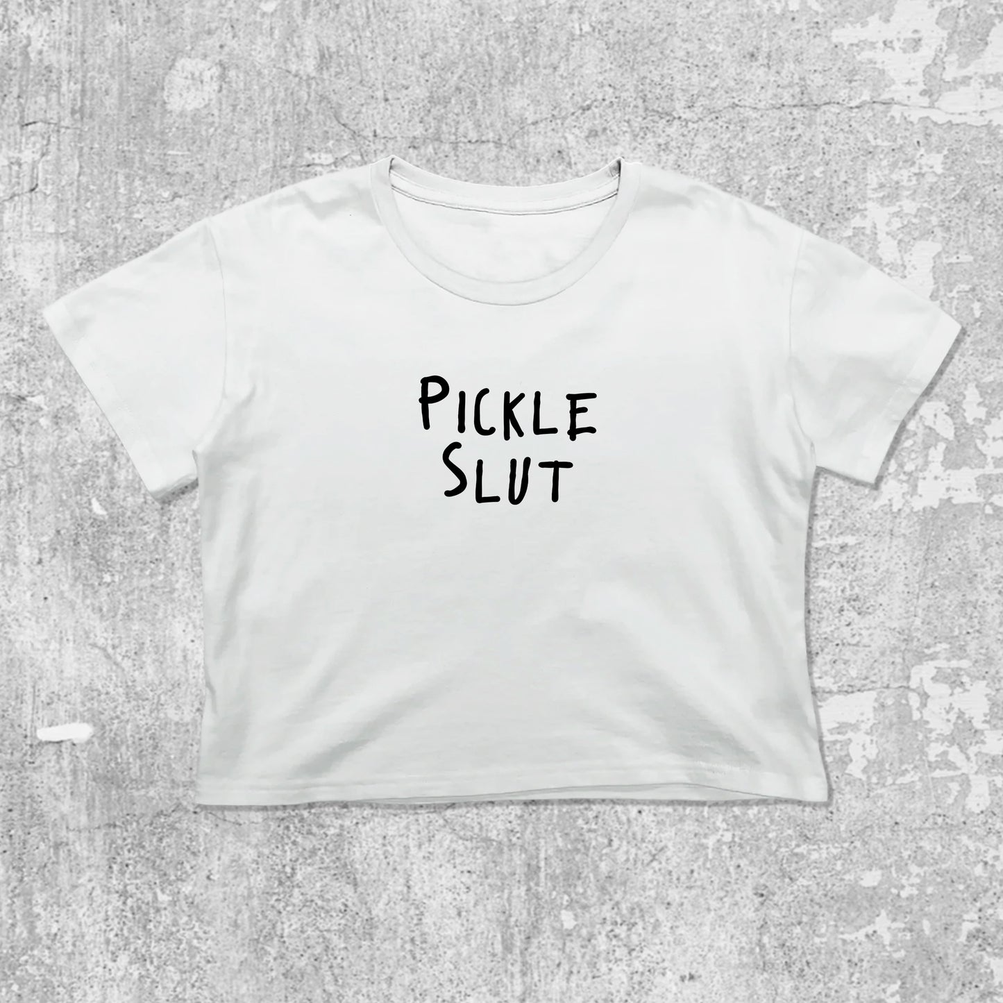 Pickle Slut graphic crop tee with cute and trendy fit, featuring playful vintage graphic, stylish cut. White crop t-shirt