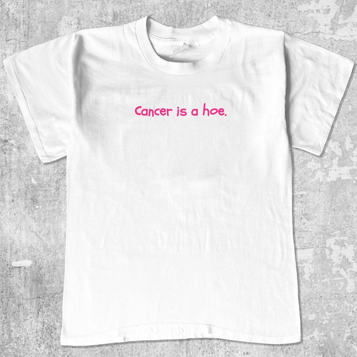 Cancer Is A Hoe graphic tee with breast cancer awareness graphic, funny and trendy graphic. Perfect for adults and gift-giving. White shirt.