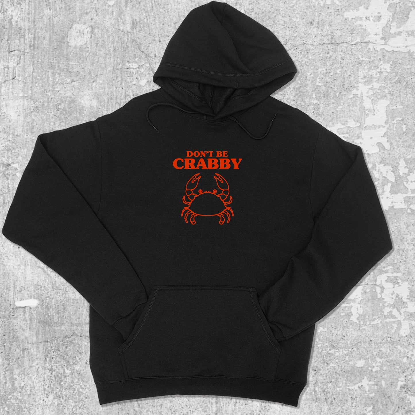 Don't Be Crabby graphic hoodie with funny and trendy artwork, casual streetwear with bold personality. Great for adults and gifting. Black hoodie.