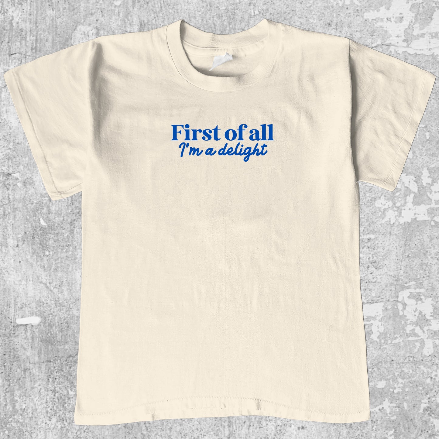 First of All I'm a Delight graphic tee with bold and humorous print, funny and simple graphic. Perfect gifts for family and friends. Cream shirt.