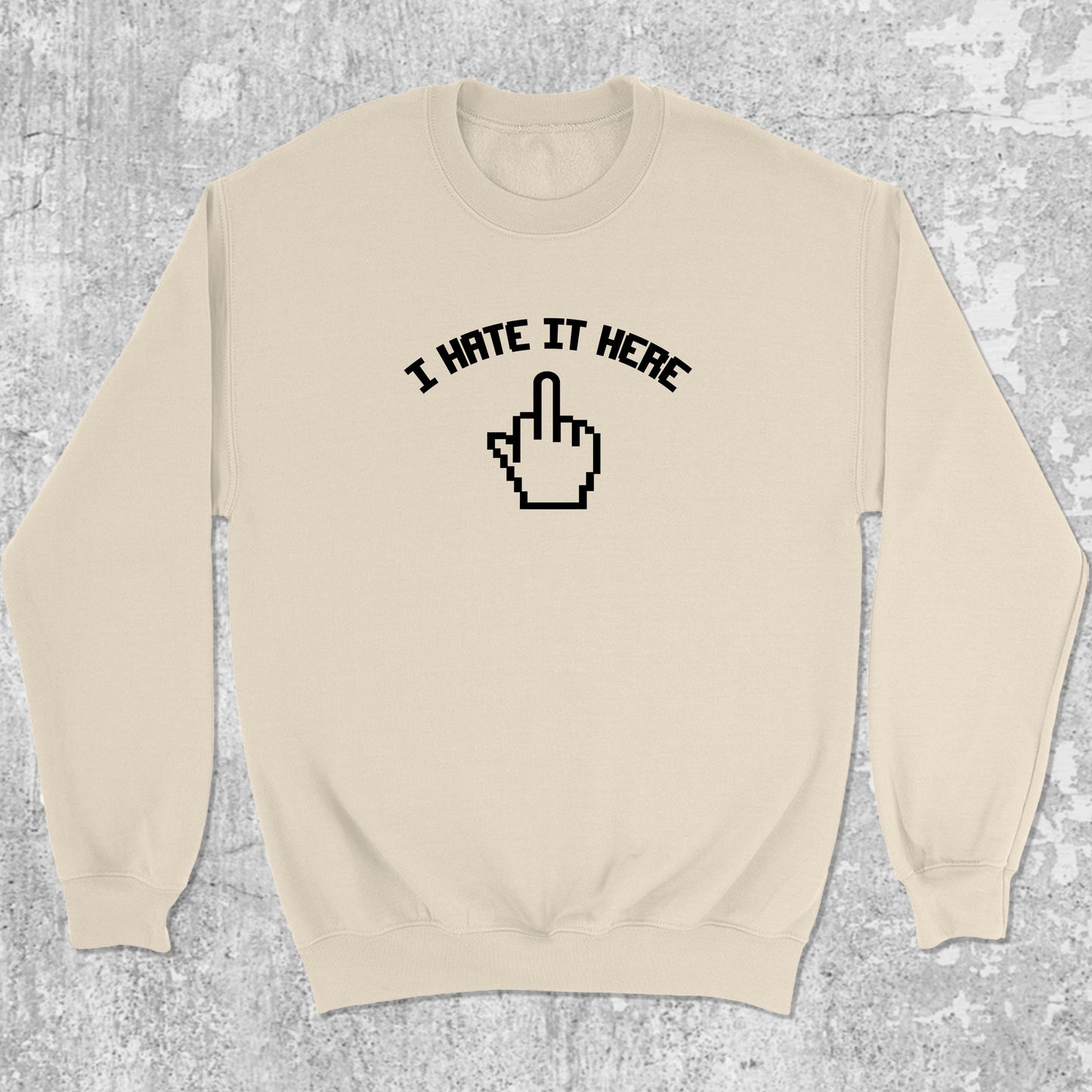 I Hate It Here graphic sweatshirt with bold and humorous print, warm and cozy graphic for everyday wear. Perfect for adults and gift-giving. Natural pullover.