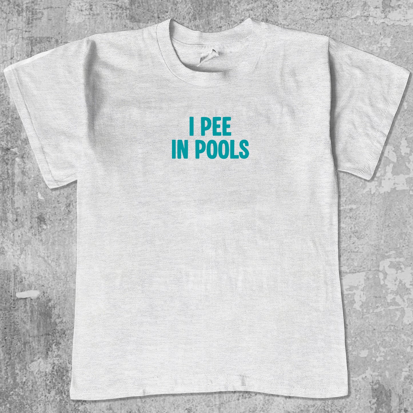 Pee In Pools graphic tee retro and funny graphic, funny and trendy graphic. Perfect for adults and gift-giving. Ash Grey shirt.