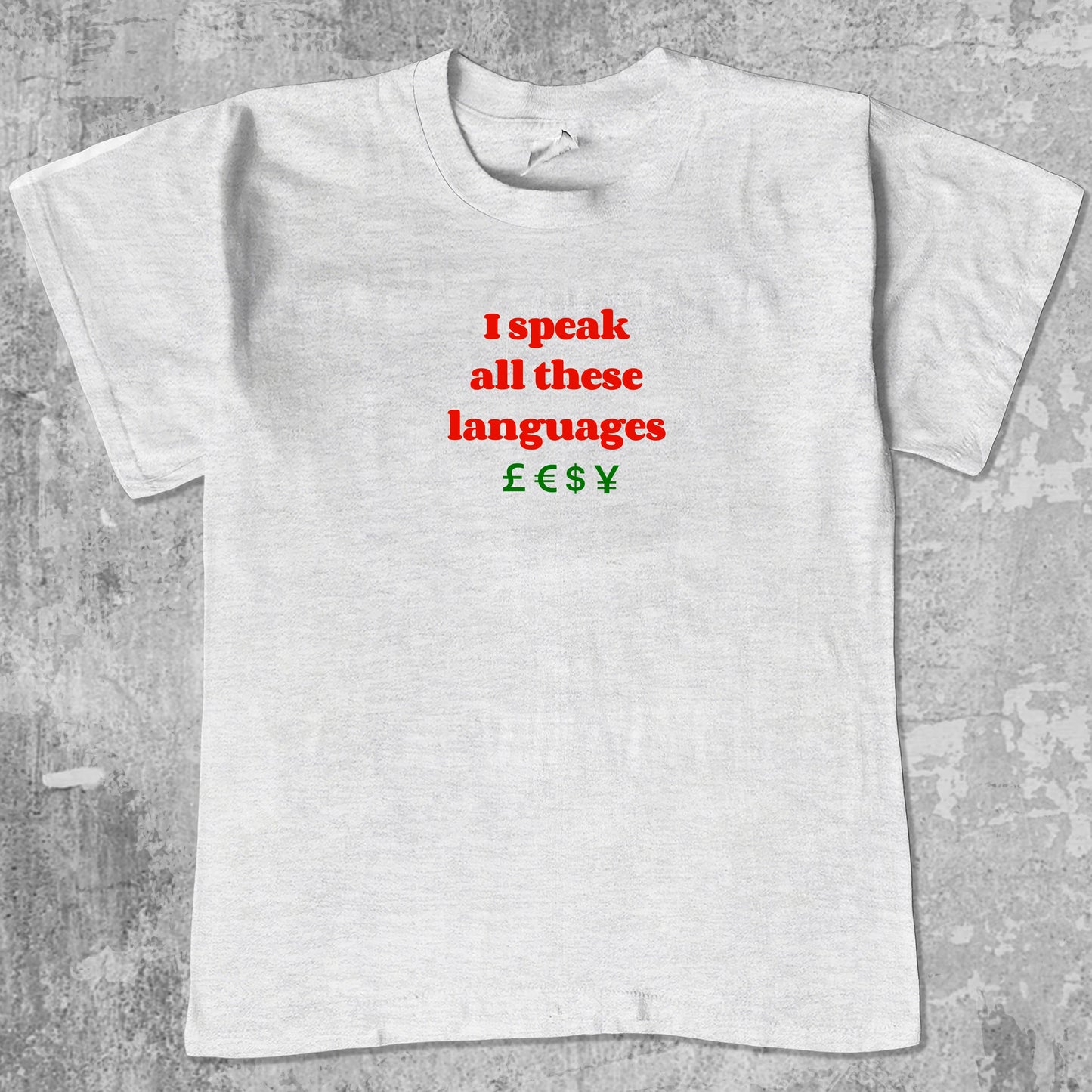 I speak all these languages graphic tee with bold and humorous print, funny and trendy graphic. Perfect for adults and gift-giving. Ash Grey shirt.