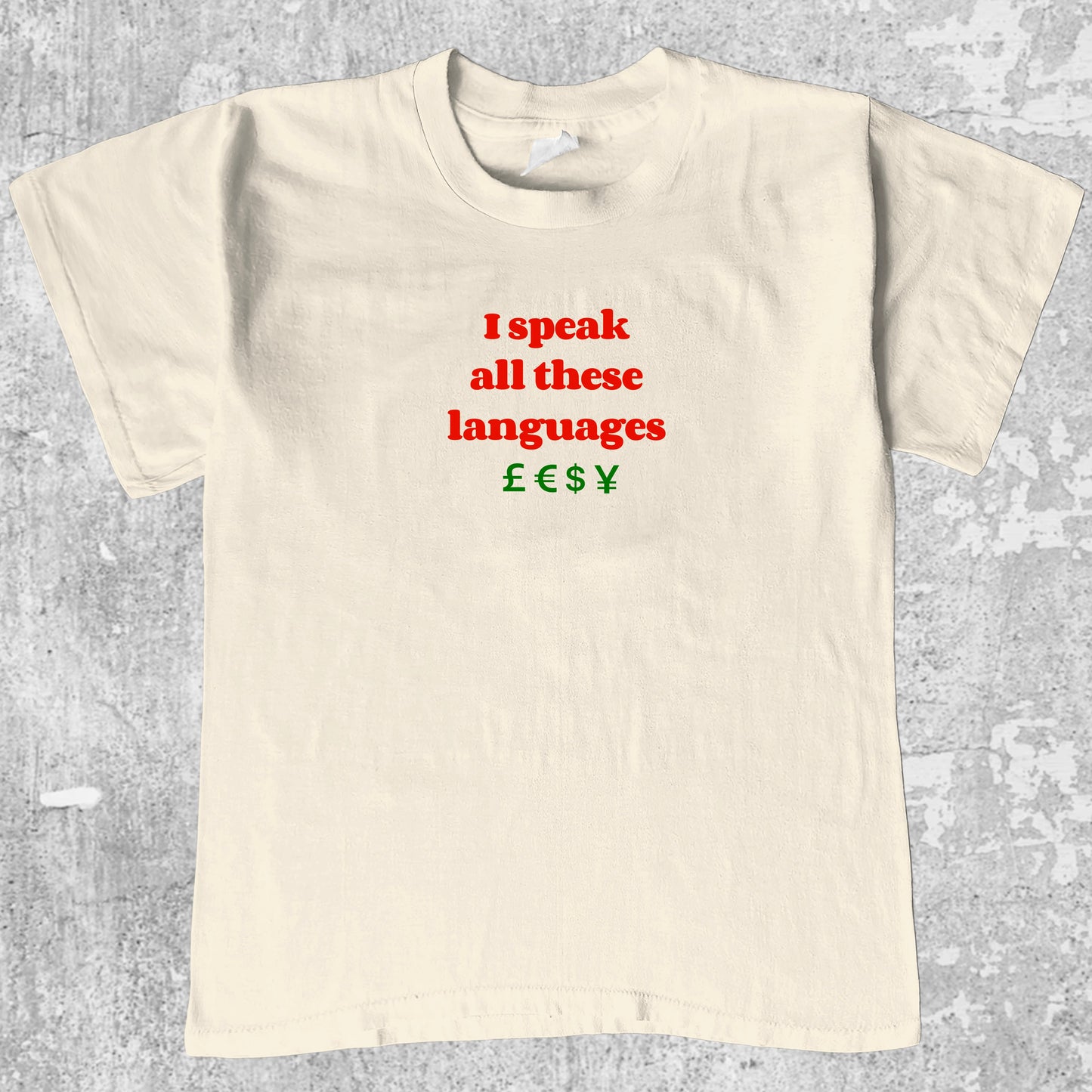 I speak all these languages graphic tee with bold and humorous print, funny and trendy graphic. Perfect for adults and gift-giving. Cream shirt.