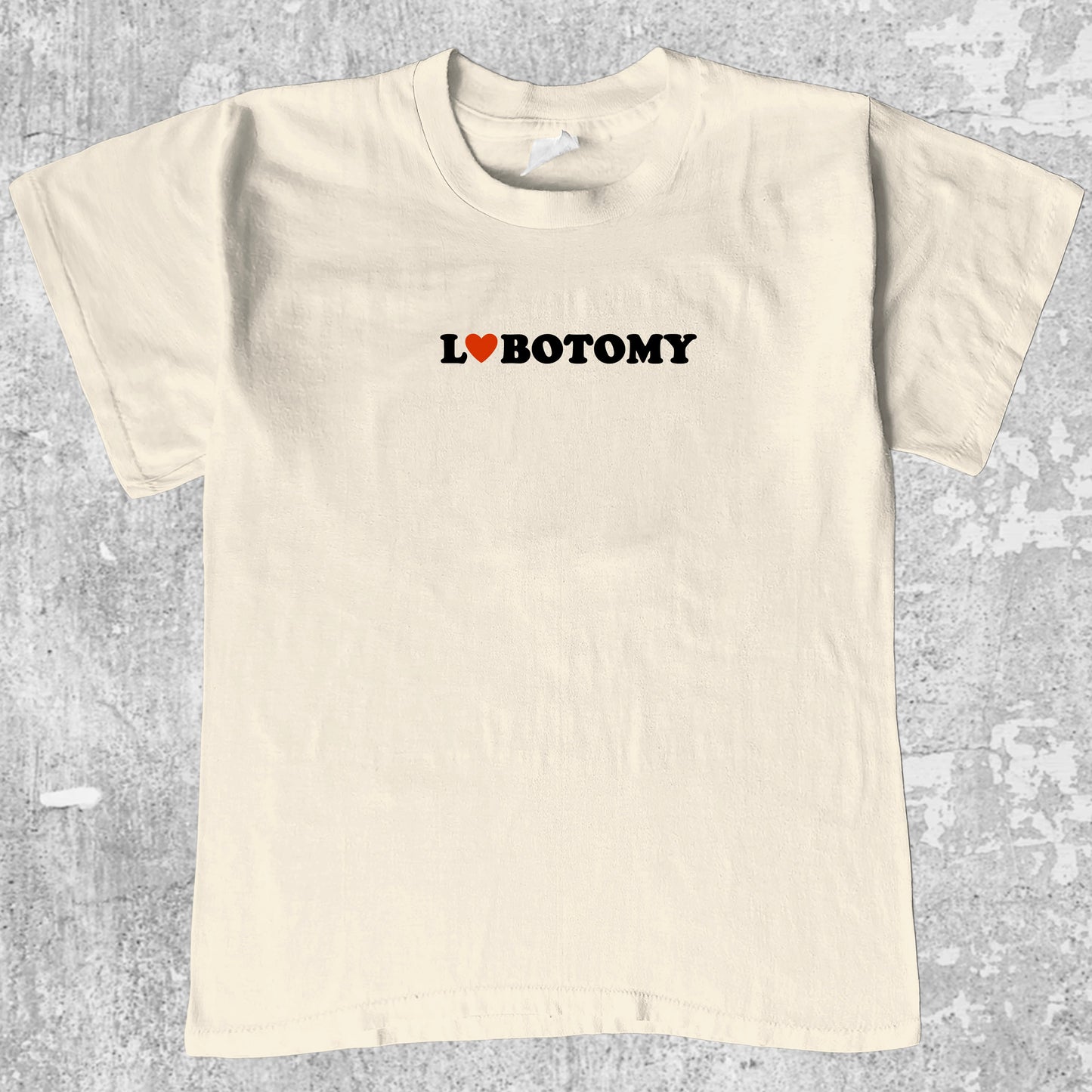Lobotomy graphic tee with retro and humorous print, funny and trendy graphic. Perfect for adults and gift-giving. Cream shirt.