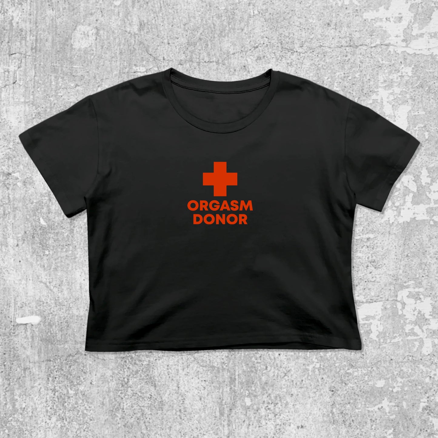 Orgasm Donor graphic crop tee with cute and trendy fit, featuring playful vintage graphic, stylish cut. Black crop t-shirt