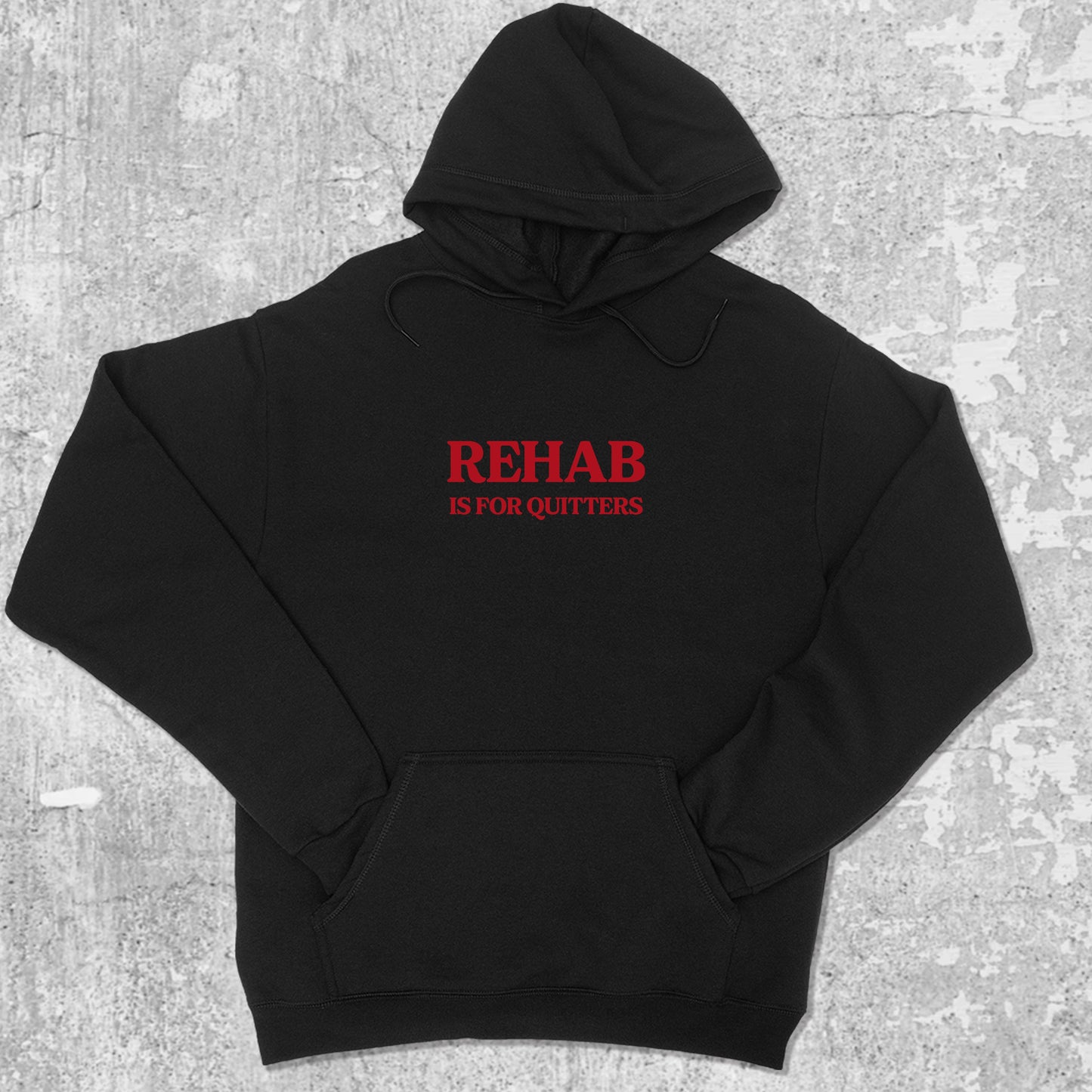 Rehab Is For Quitters graphic hoodie with funny and trendy artwork, casual streetwear with bold personality. Great for adults and gifting. Black hoodie.
