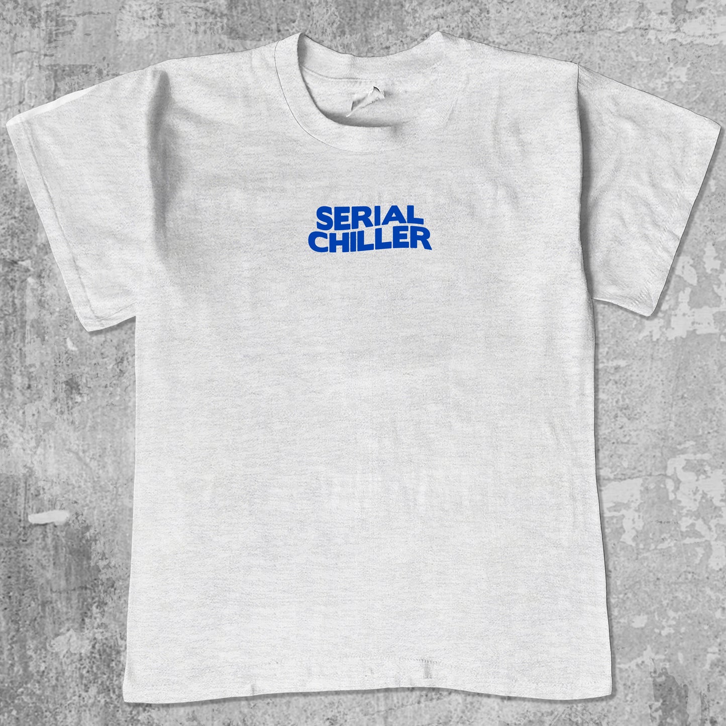 Serial Chiller graphic tee with bold and humorous print, funny and trendy graphic. Perfect for adults and gift-giving. Ash Grey shirt.