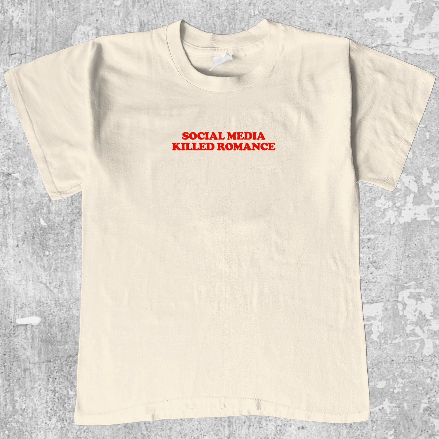 Social Media Killed Romance graphic tee with bold and humorous print, funny and trendy graphic. Perfect for adults and gift-giving. Cream shirt.