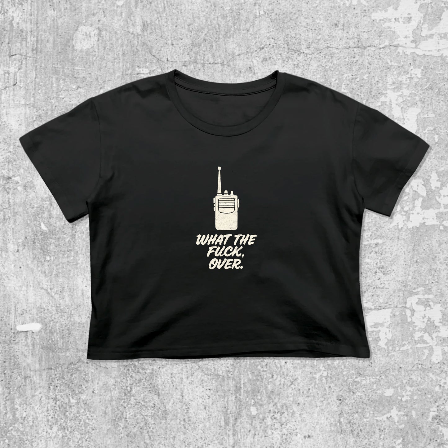 What The Fuck Over graphic crop tee with cute and trendy fit, featuring playful vintage graphic, stylish cut. Black crop t-shirt