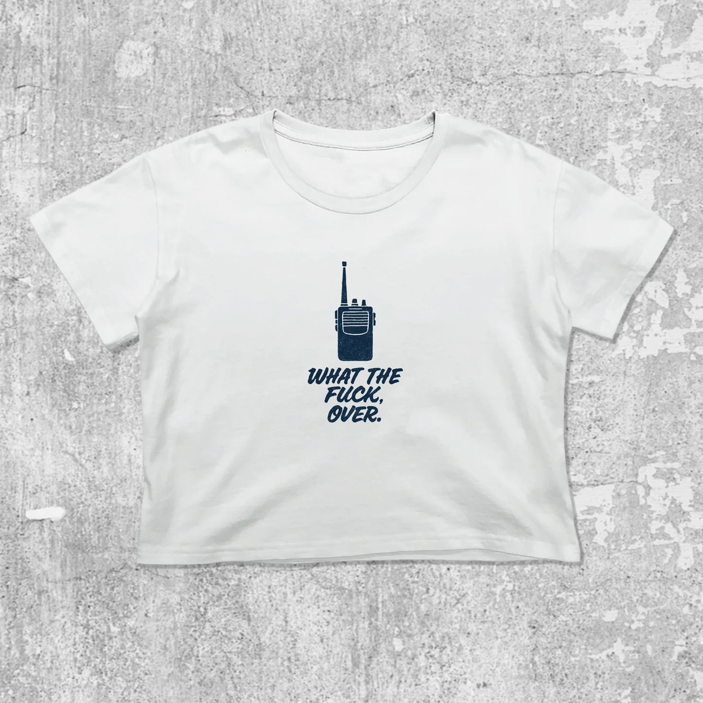 What The Fuck Over graphic crop tee with cute and trendy fit, featuring playful vintage graphic, stylish cut. White crop t-shirt