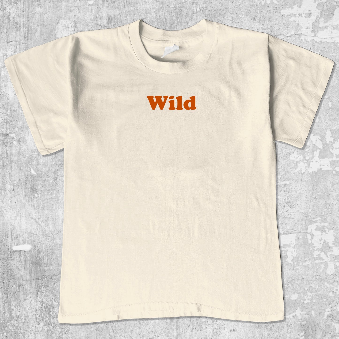 Wild graphic tee with bold and humorous print, funny and trendy graphic. Perfect for adults and gift-giving. Cream shirt.