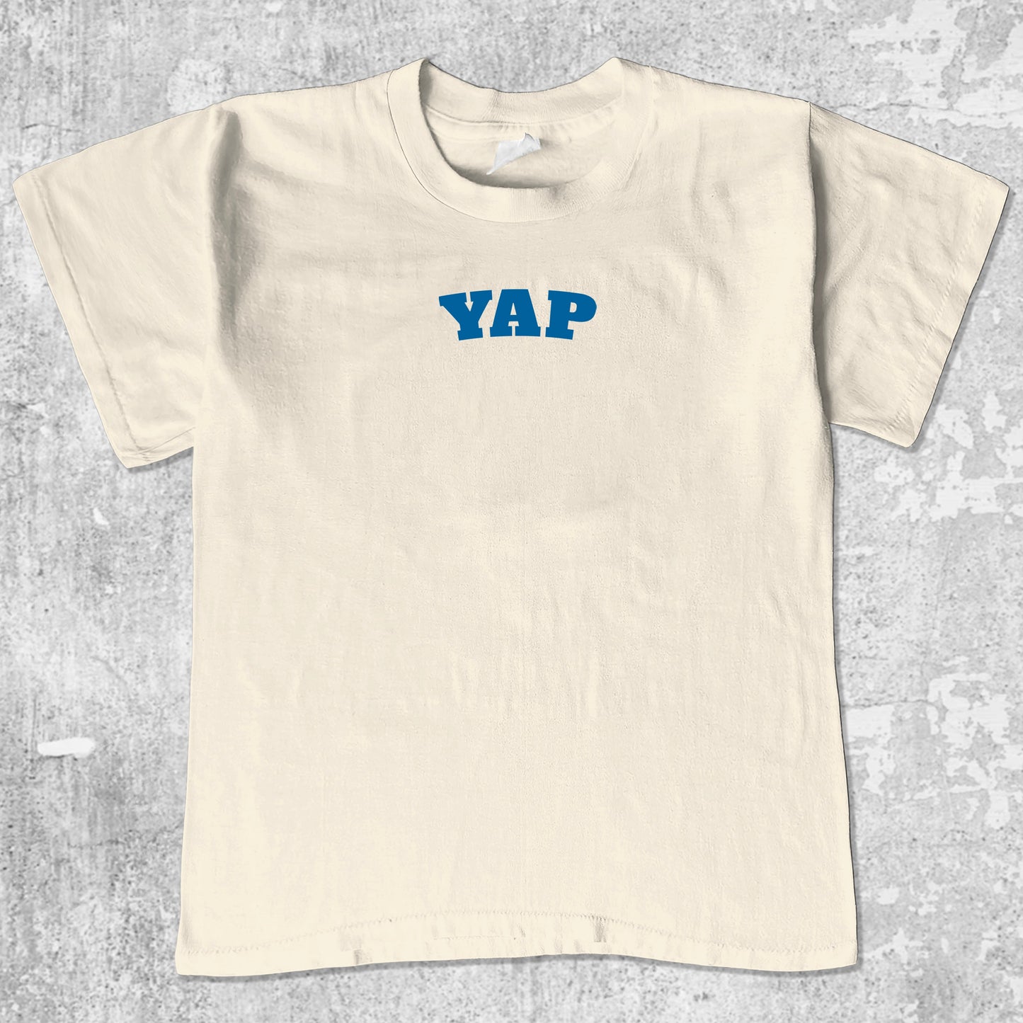 Yap graphic tee with bold and humorous print, funny and trendy graphic. Perfect for adults and gift-giving. Cream shirt.