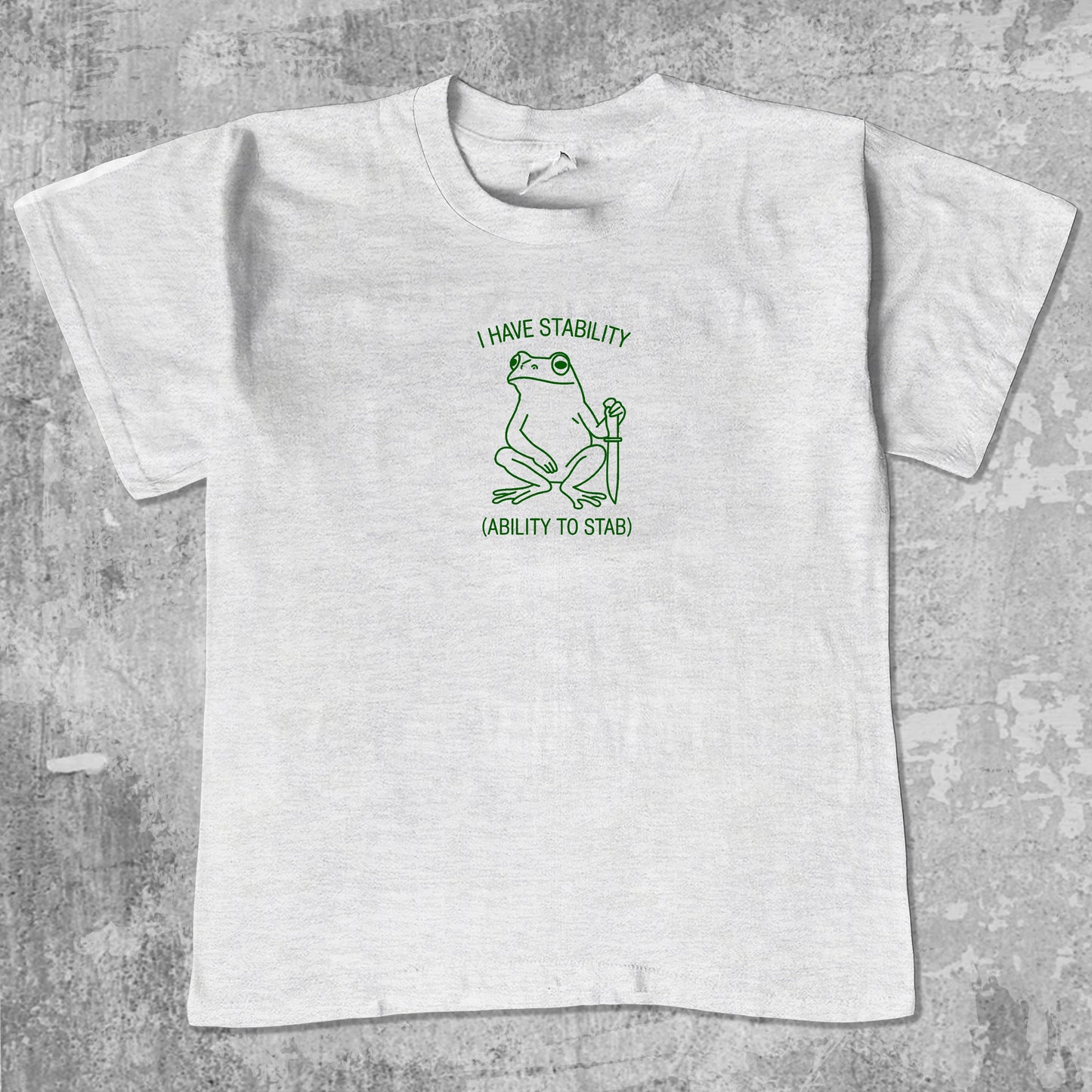 I Have Stability Ability To Stab unisex graphic t-shirt. Vintage trending meme tee. Funny and unique graphic tees. I Have Stability Ability To Stab graphi tee Ash Grey 1