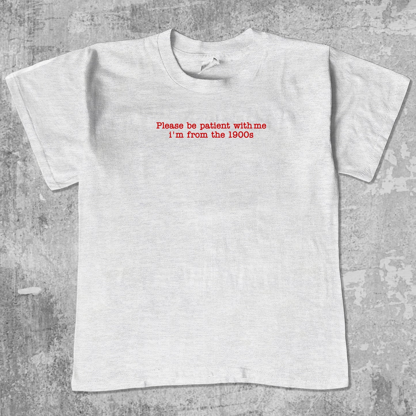 Please Be Patient With Me I'm From The 1900s unisex graphic t-shirt. Vintage trending meme tee. Funny and unique graphic tees. Please Be Patient With Me I'm From The 1900s graphi tee Ash Grey 1