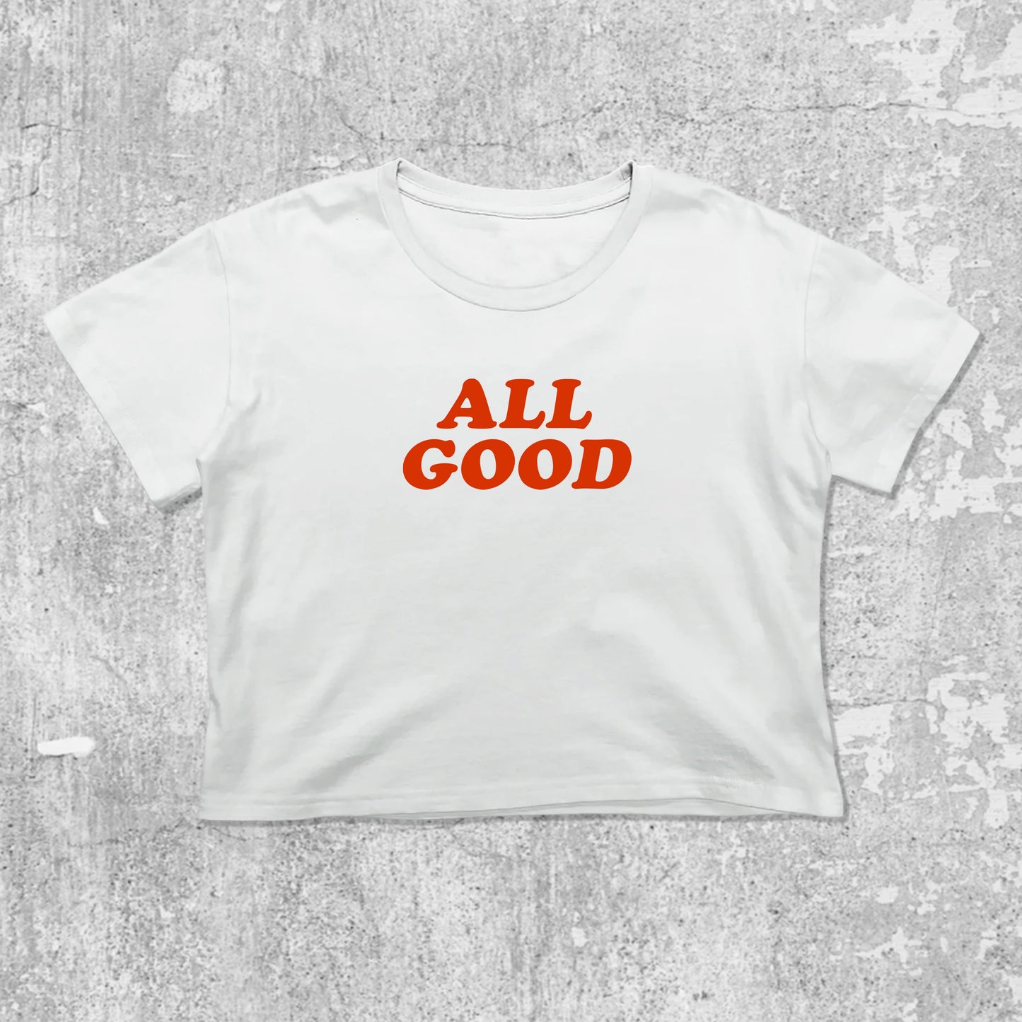 ALL GOOD graphic crop tee with cute and trendy fit, featuring playful vintage graphic, stylish cut. White crop t-shirt