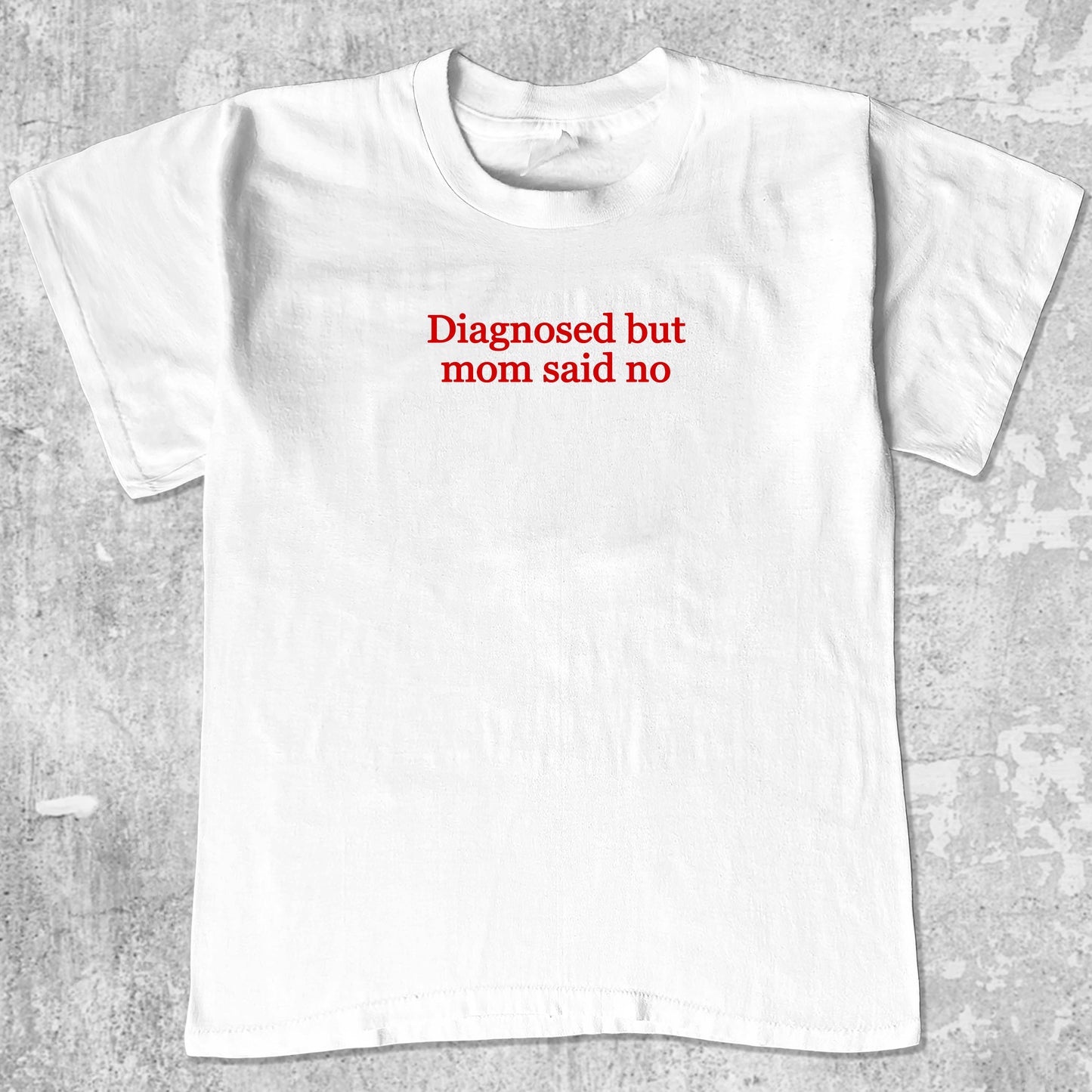 Diagnosed But Mom Said No graphic tee with bold and humorous print, funny and simple graphic. Perfect gifts for family and friends. White shirt.