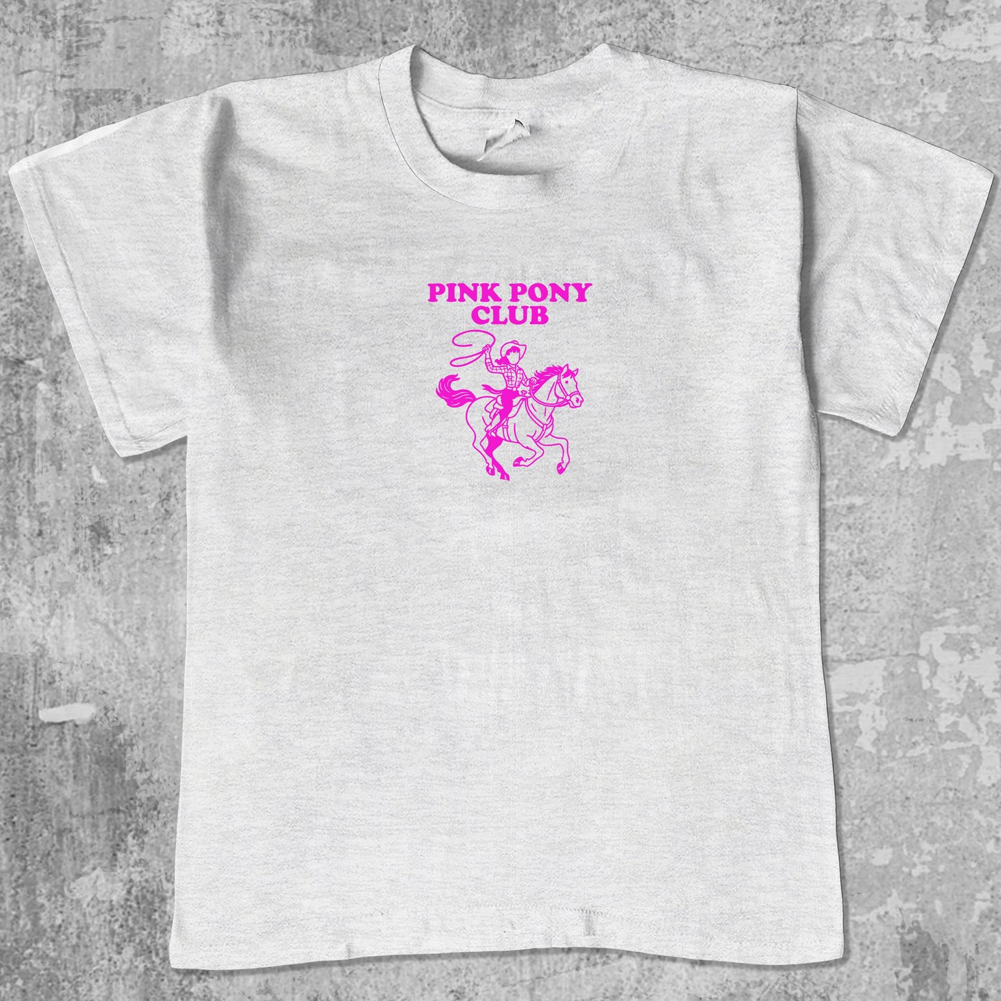 Pink Pony Club graphic tee with bold and humorous print, funny and trendy graphic. Perfect for adults and gift-giving. Ash Grey shirt.