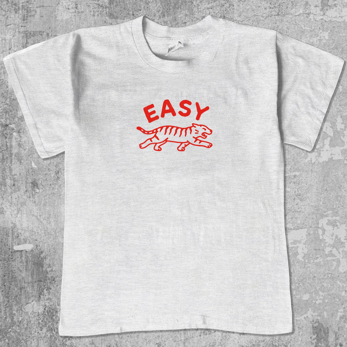 Easy Tiger graphic tee with bold and humorous print, funny and trendy graphic. Perfect gifts for friends and family. Ash Grey shirt.
