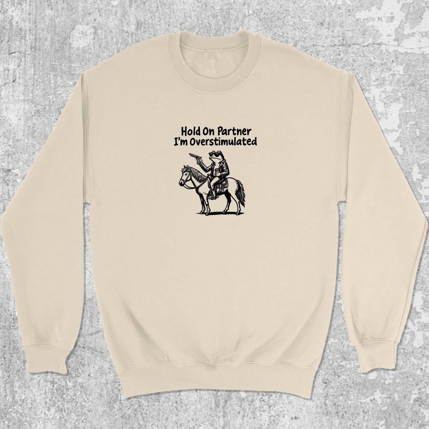 Hold On Partner I'm Overstimulated graphic sweatshirt with funny frogs print, warm and cozy graphic for everyday wear. Perfect for Christmas gifts for friends and family. Natural pullover.