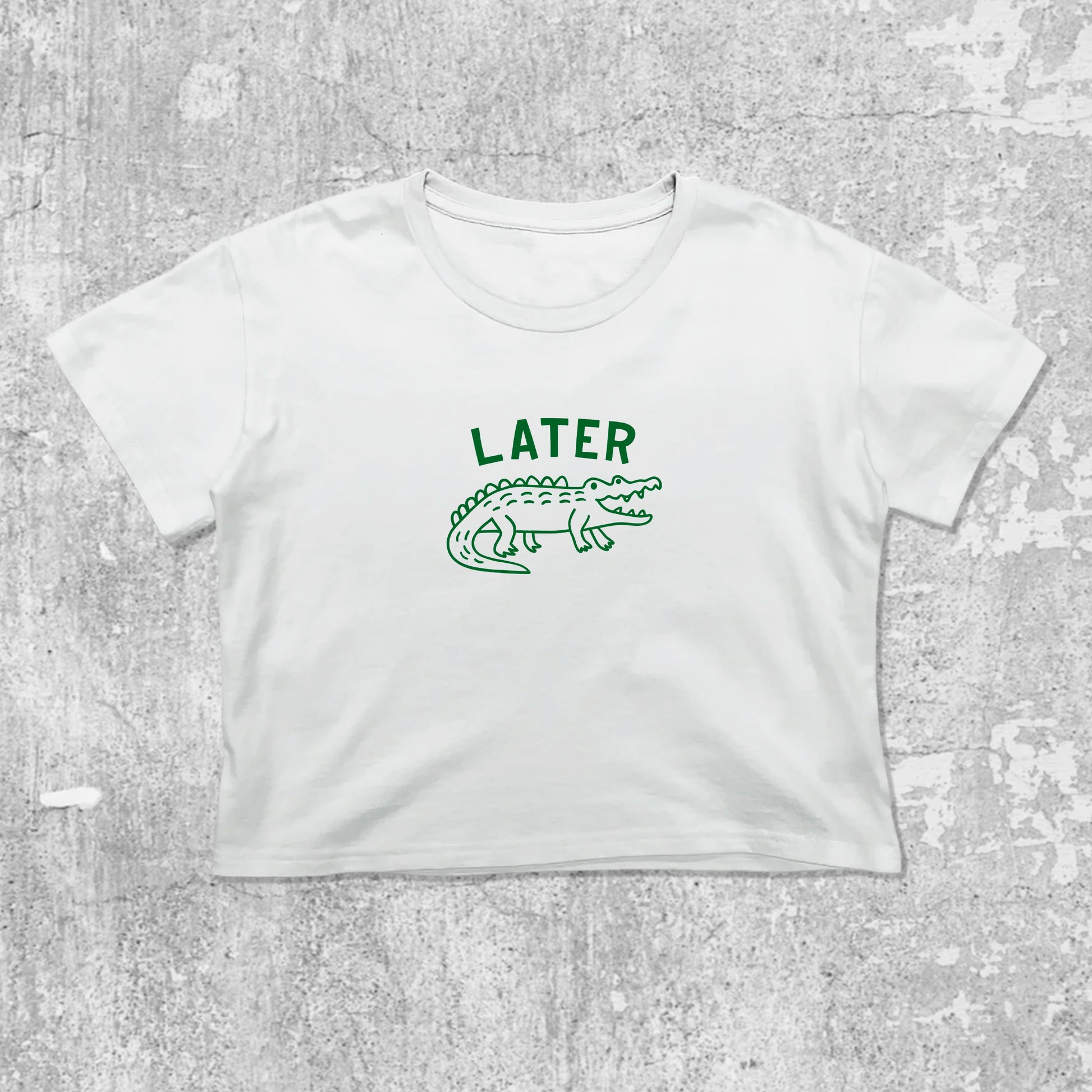 Later Gator graphic crop tee with cute and trendy fit, featuring playful vintage graphic, stylish cut. White crop t-shirt