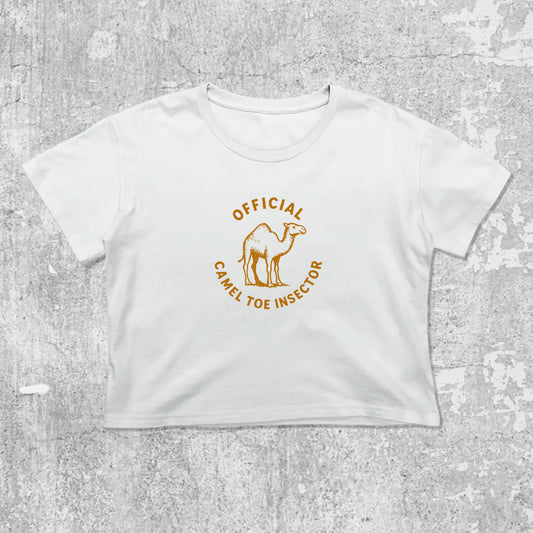 Official Camel Toe Inspector graphic crop tee with cute and trendy fit, featuring playful vintage graphic, stylish cut. White crop t-shirt