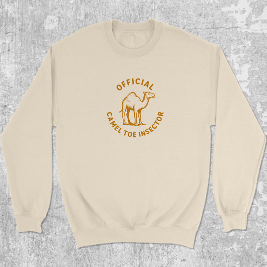 Official Camel Toe Inspector graphic sweatshirt with bold and humorous print, warm and cozy graphic for everyday wear. Perfect for adults and gift-giving. Natural pullover.