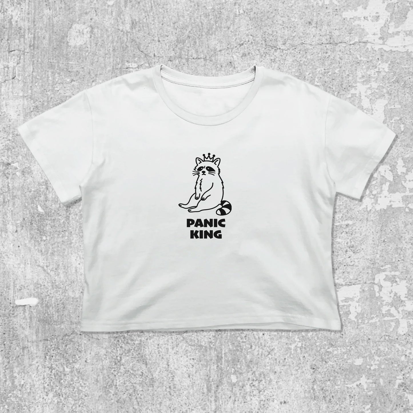 Panic King Raccoon graphic crop tee with cute and trendy fit, featuring playful vintage graphic, stylish cut. White crop t-shirt