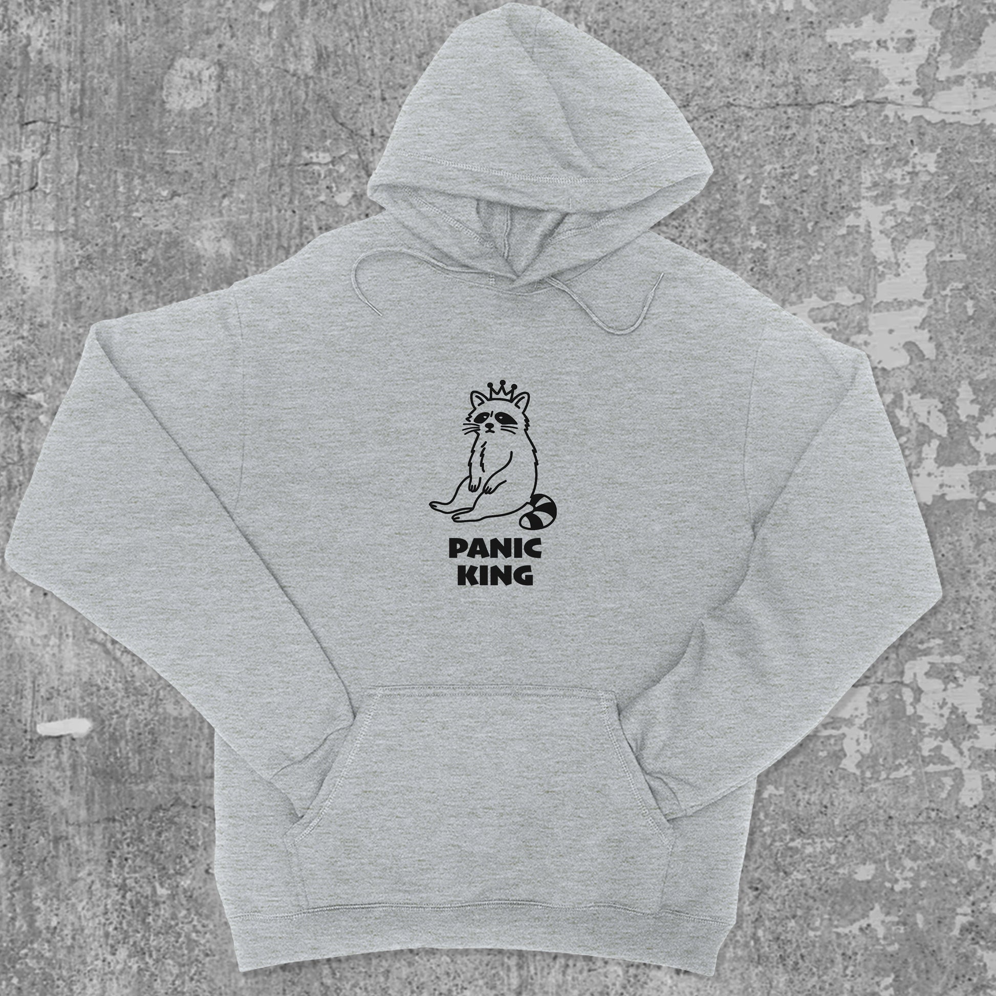 Panic King Raccoon graphic hoodie with funny and trendy artwork, casual streetwear with bold personality. Great for adults and gifting. Heather Grey hoodie.