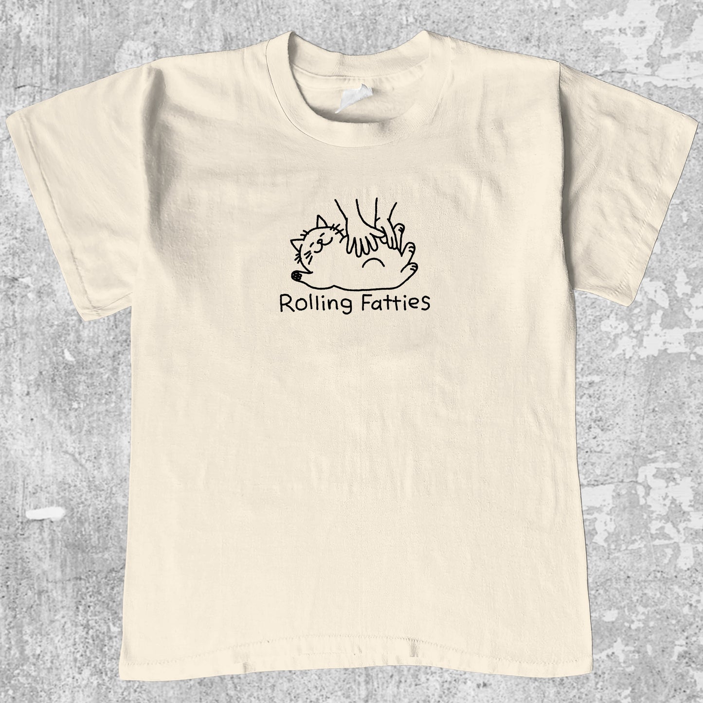 Rolling Fatties graphic tee with cute cat graphic, funny and simple graphic. Perfect gifts for family and friends. Cream shirt.