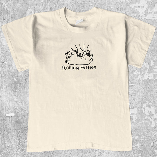 Rolling Fatties graphic tee with cute cat graphic, funny and simple graphic. Perfect gifts for family and friends. Cream shirt.