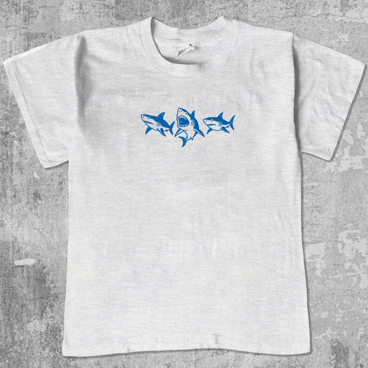 Sharks graphic tee with sharks doodle print, funny and simple graphic. Perfect gifts for family and friends. Ash Grey shirt.