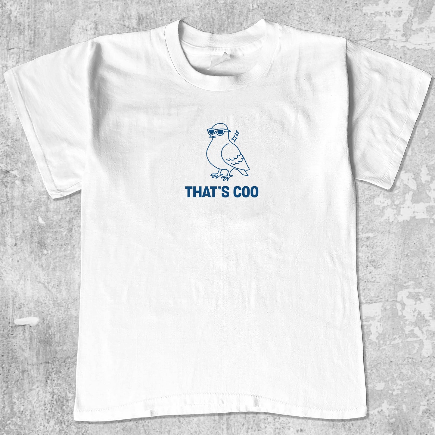 That's Coo graphic tee with bold and humorous print, funny and trendy graphic. Perfect for adults and gift-giving. White shirt.