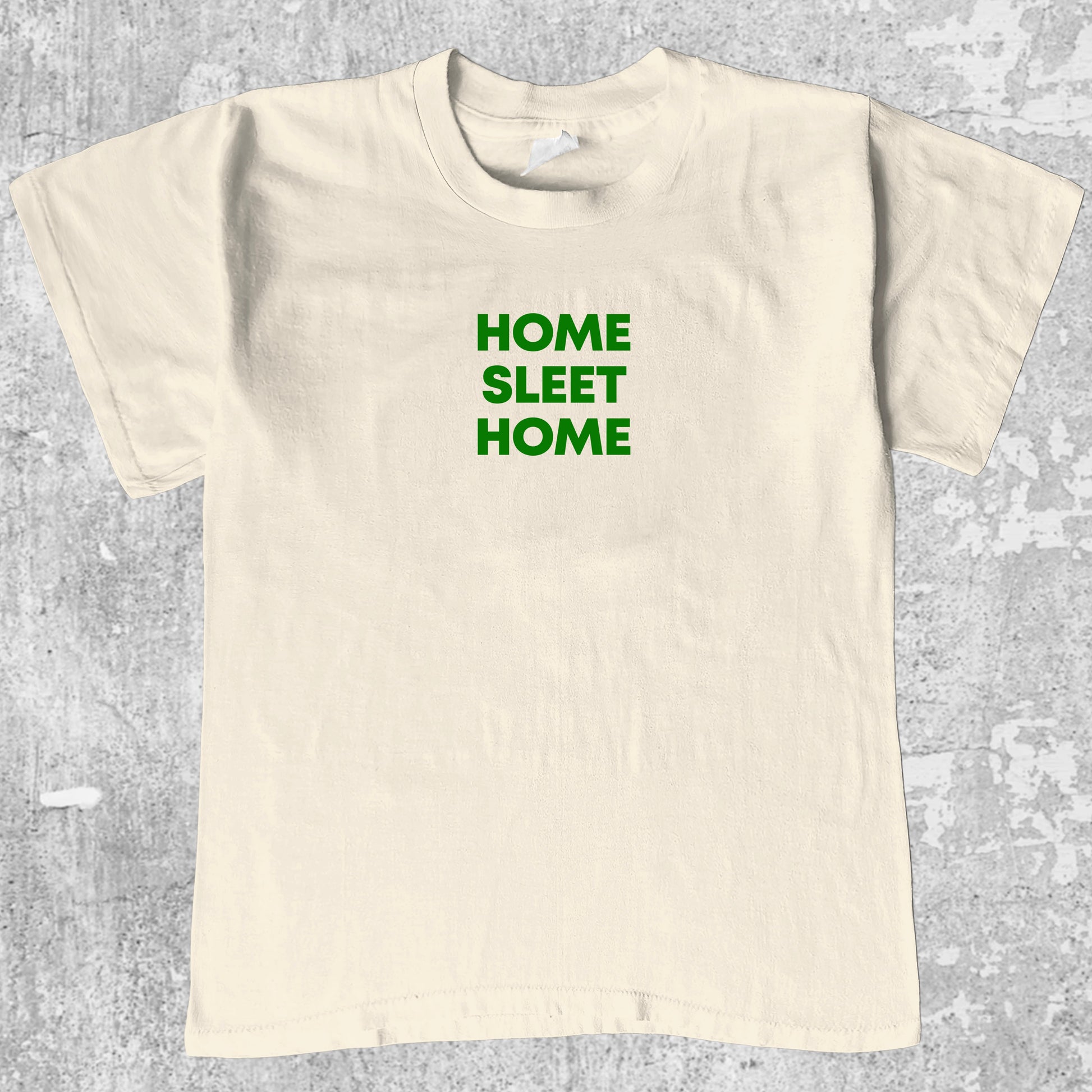 Home Sleet Home graphic tee with cute and humorous print, funny and Vintage graphic. Perfect for christmas gifts. Cream shirt.