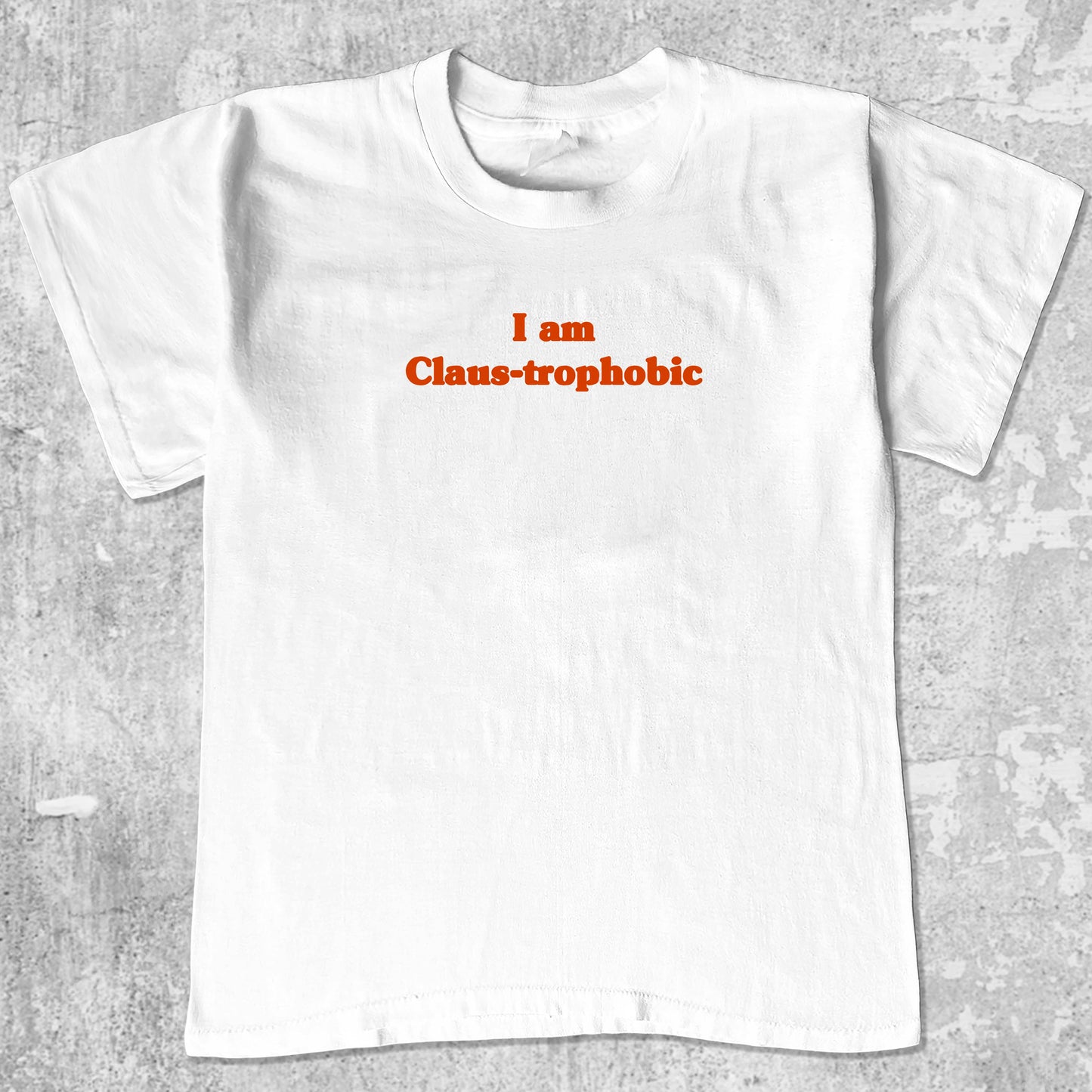 I'm Claus-trophobic graphic tee with cute and humorous print, funny and Vintage graphic. Perfect for christmas gifts. White shirt.