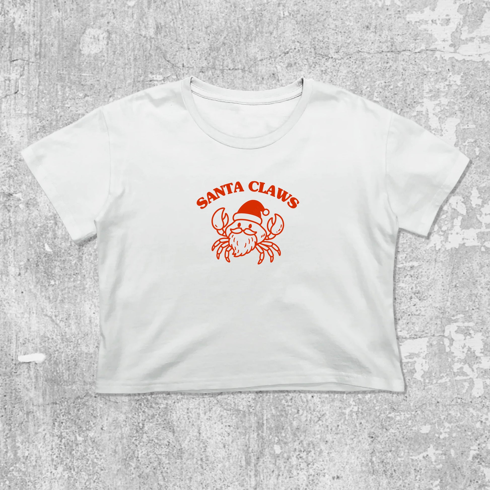 Santa Claws Crab graphic crop tee with funny christmas graphic, featuring playful vintage graphic, stylish cut. White crop t-shirt