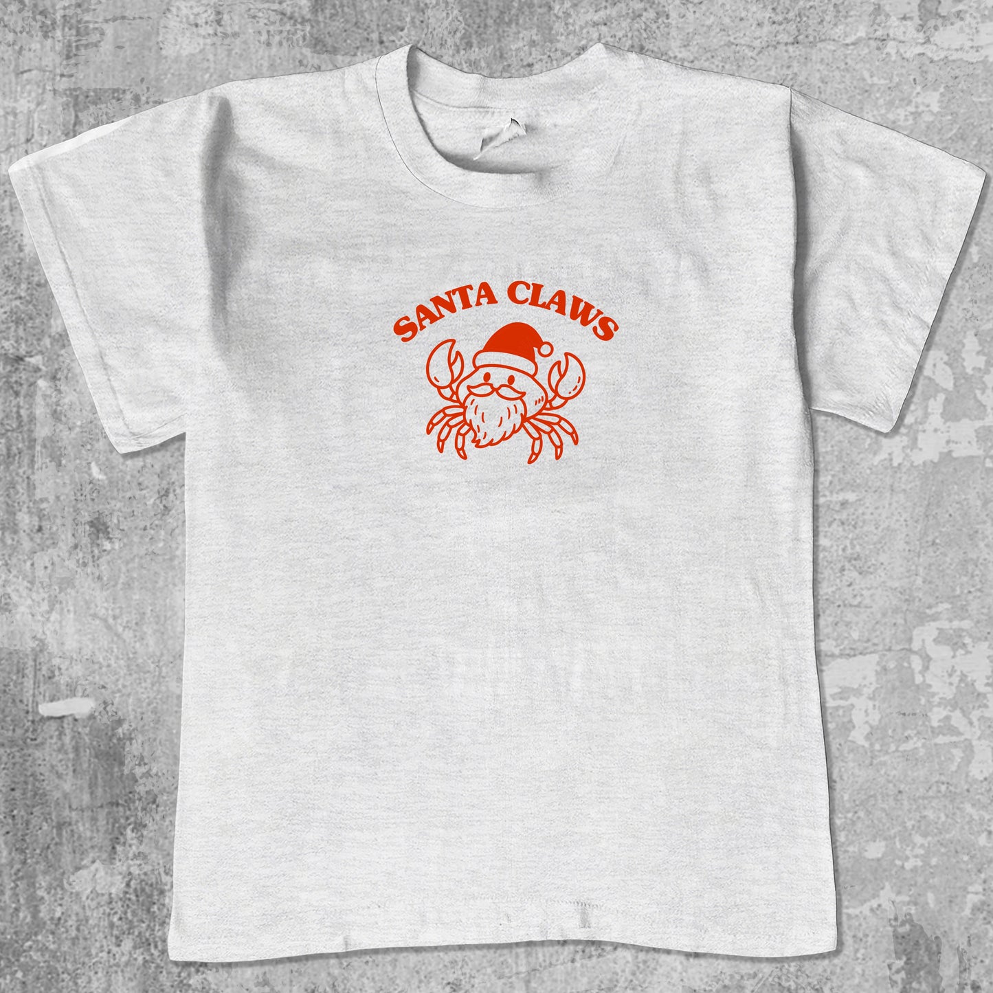 Santa Claws Crab graphic tee the best Christmas funny gifts, funny and trendy graphic. Perfect for adults and gift-giving. Ash Grey shirt.