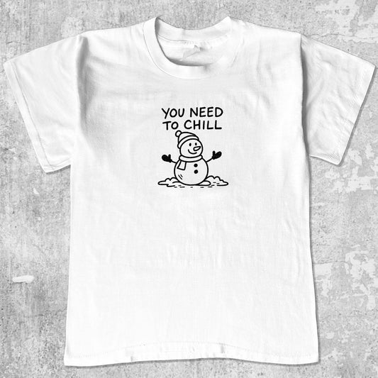 You Need To Chill graphic tee with christmas snowman print, funny and simple graphic. Perfect gifts for Christmas. White shirt.