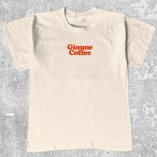 Gimme Coffee graphic tee with bold and retro print, funny and trendy graphic. Perfect for Christmas gifts for friends and family. Cream shirt.