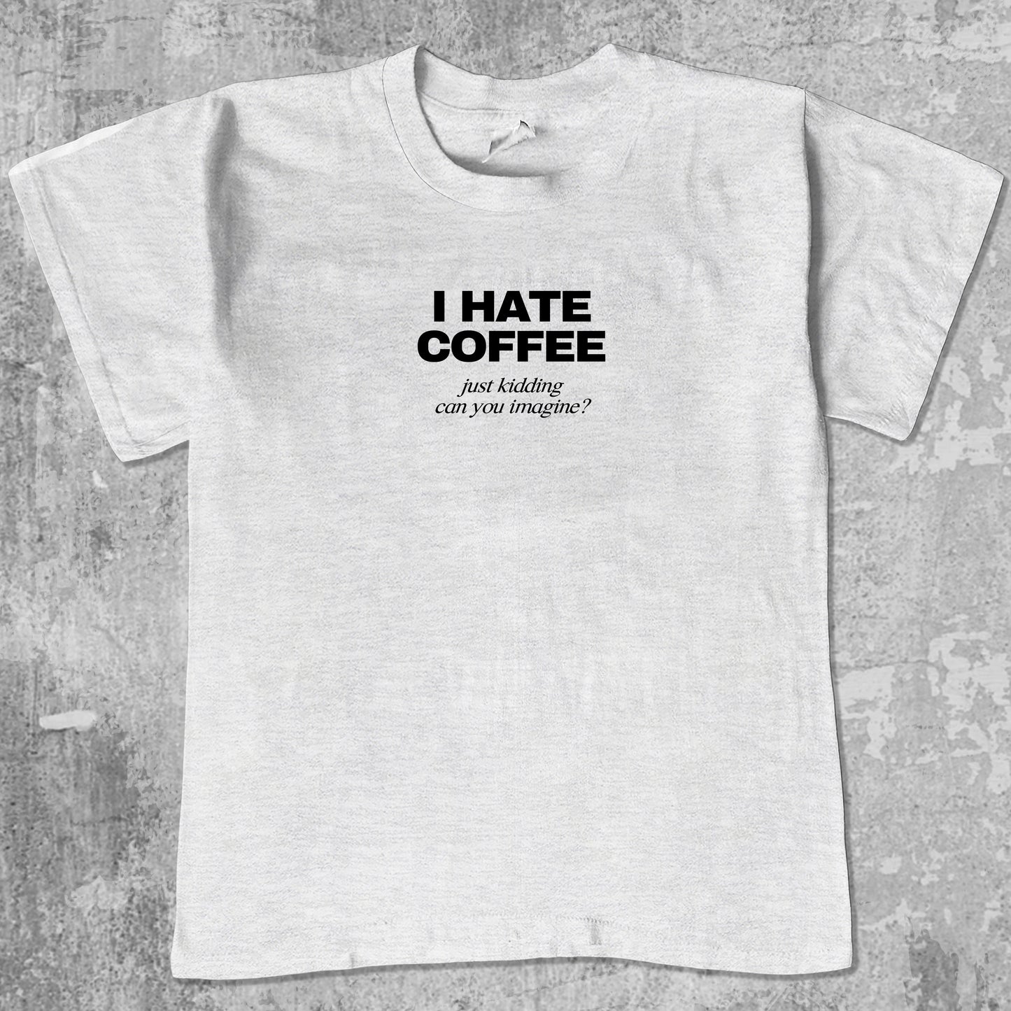 I Hate Coffee Just Kidding graphic tee. Retro and Vintage funny quotes graphic shirts. Perfect funny gift for Christmas. Ash Grey shirt.