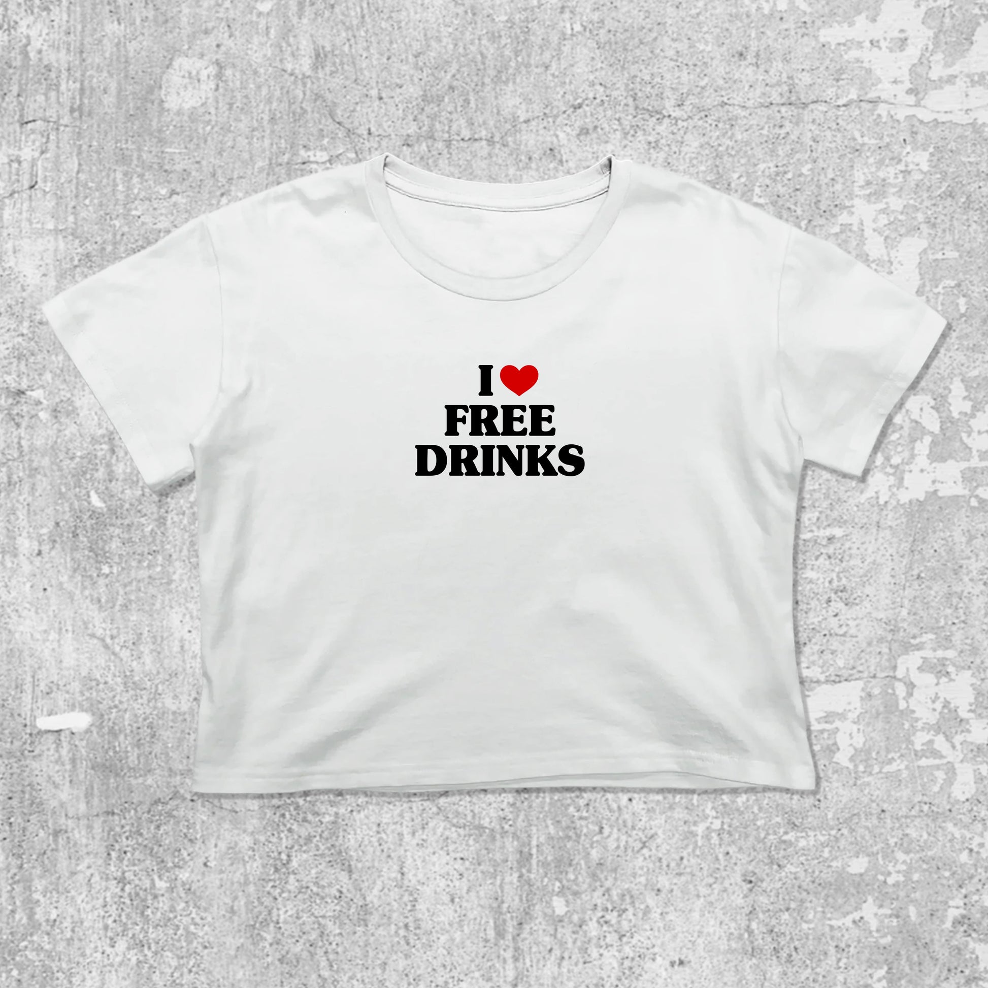 I Love Free Drinks graphic crop tee with cute and trendy fit, featuring playful vintage graphic, stylish cut. White crop t-shirt