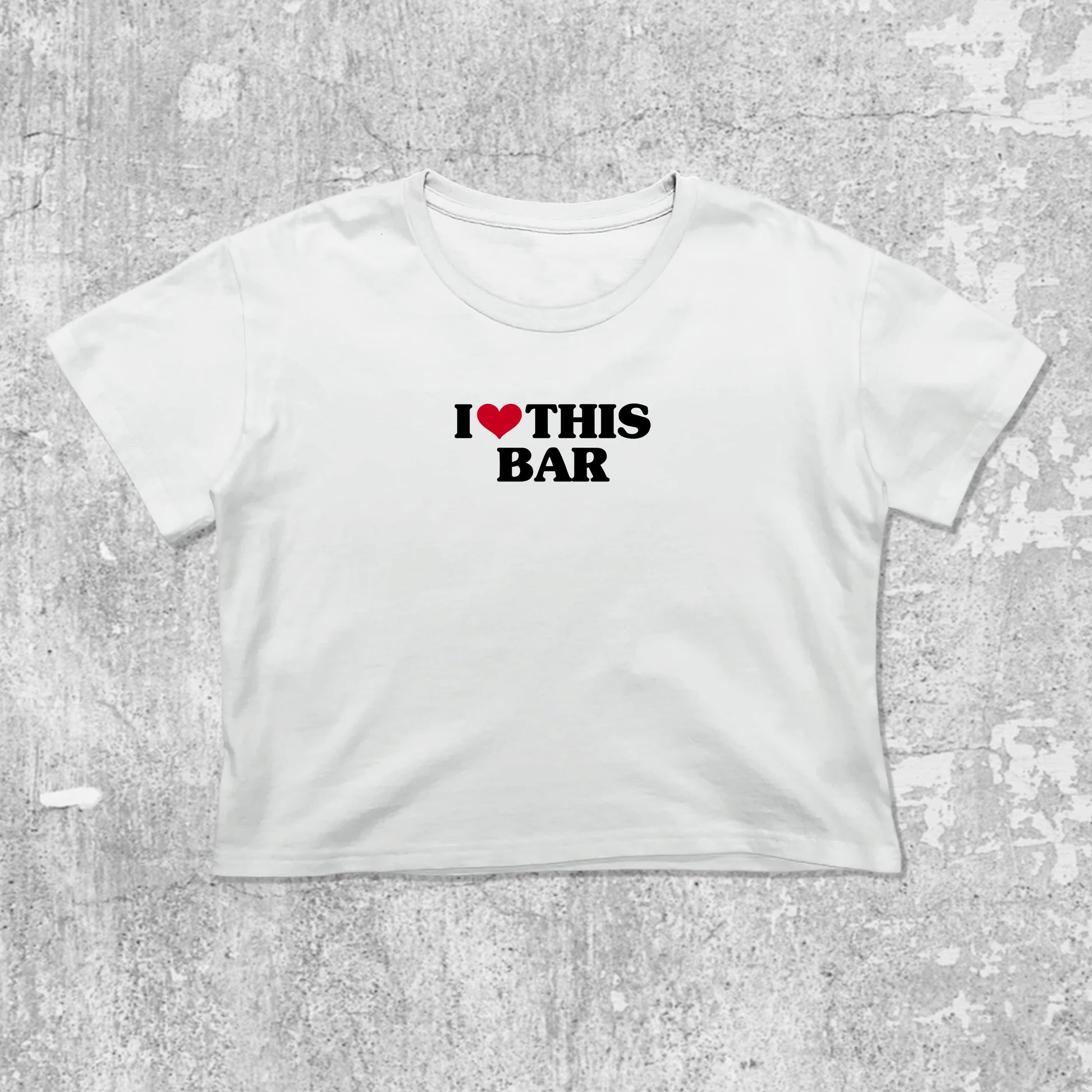 I Love This Bar graphic crop tee with cute and trendy fit, featuring playful vintage graphic, stylish cut. White crop t-shirt