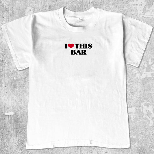 I Love This Bar graphic tee with funny halloween print, funny and trendy graphic. Perfect for special halloween. White shirt.